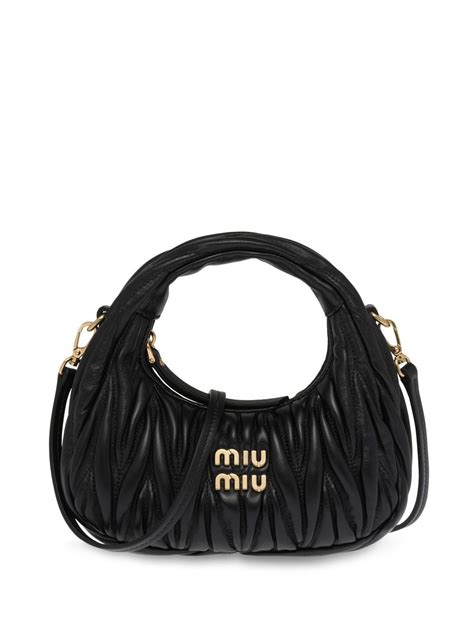 miu miu matelasse nero|MIU MIU .